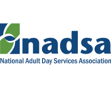 Logo of the National Adult Day Services Association (NADSA). The left part of the logo features two interlocking rings, one green and one blue, with the letters "nadsa" and the full name written in blue to the right. Ideal for promoting senior care near Camden County NJ.